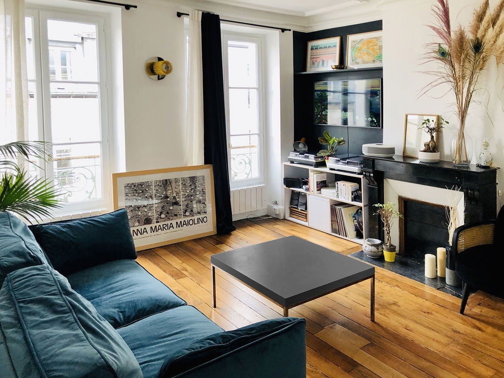 découvrez un appartement haussmannien alliant élégance classique et design moderne, offrant un cadre chic et confortable au cœur de la ville.