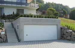 découvrez nos solutions de garage enterré pour optimiser l'espace extérieur et sécuriser votre véhicule en toute discrétion.