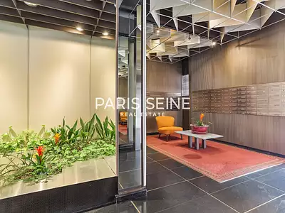 découvrez un bâtiment à rénover idéalement situé près du 15e arrondissement de paris. opportunité unique pour projet immobilier dans un quartier dynamique.