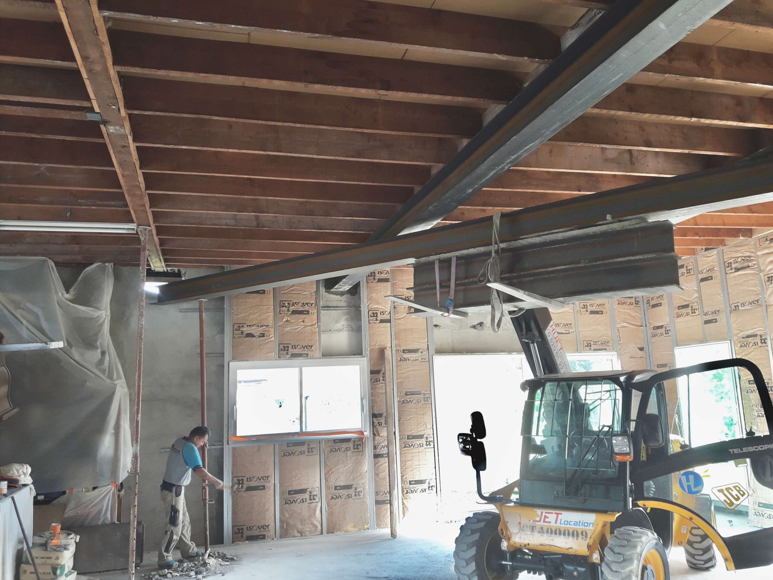 service professionnel de pose de poutre ipn pour maison à étage à paris 15. renforcez la structure de votre habitation avec des experts qualifiés.