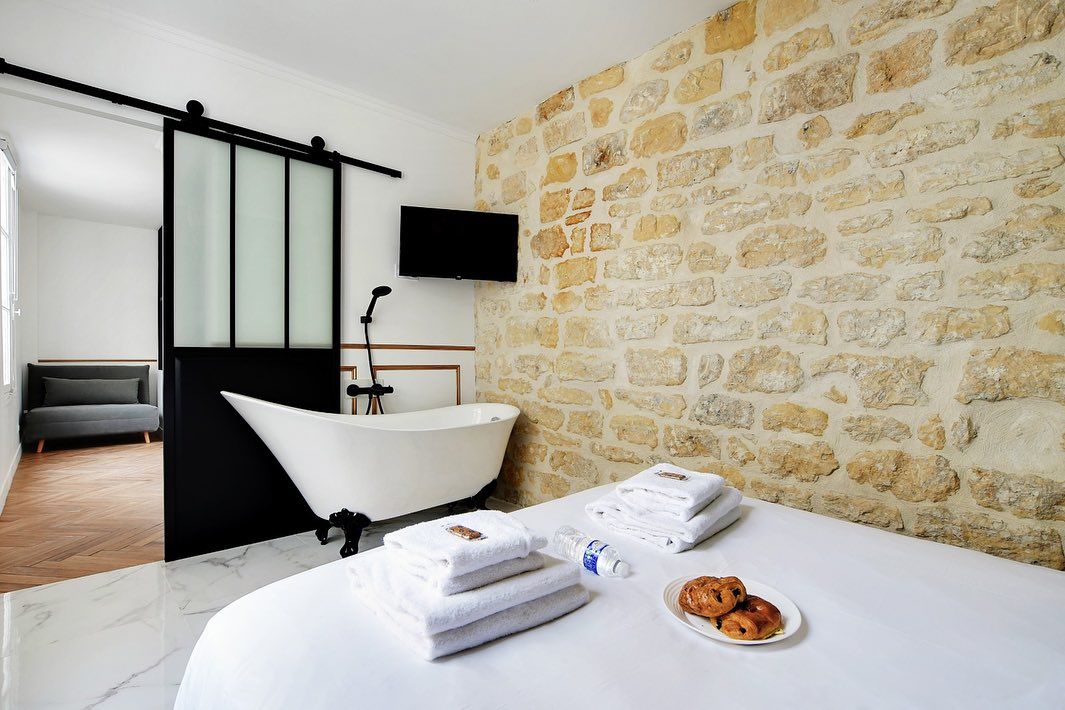 expertise en rénovation d'immeubles historiques à paris 2, alliant préservation du patrimoine et modernité pour sublimer votre bien immobilier.