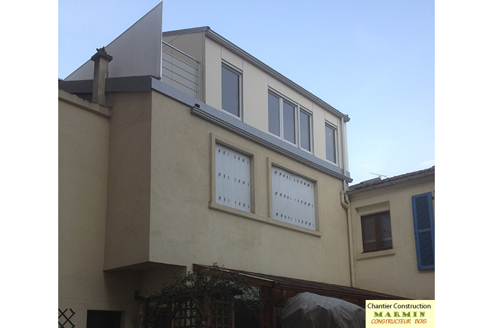 découvrez notre expertise en surélévation bois élégante à vincennes (94) pour agrandir votre espace avec style et durabilité.