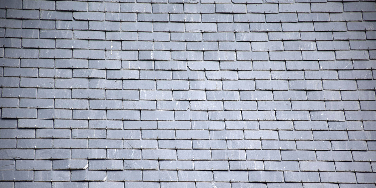 découvrez l'élégance et la durabilité des toitures en ardoises, un choix esthétique et robuste pour protéger votre maison avec style.