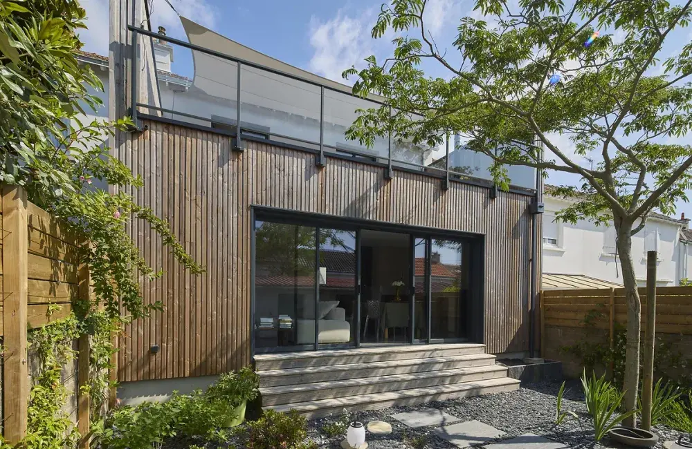 découvrez le budget moyen pour une extension de maison de 80m2 : coûts, matériaux, et conseils pour bien planifier votre projet d'agrandissement.