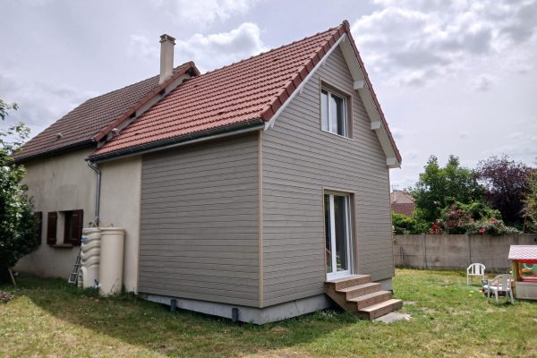 découvrez notre extension en bois de 20m², solution idéale pour agrandir votre espace de vie avec un matériau naturel, durable et esthétique.