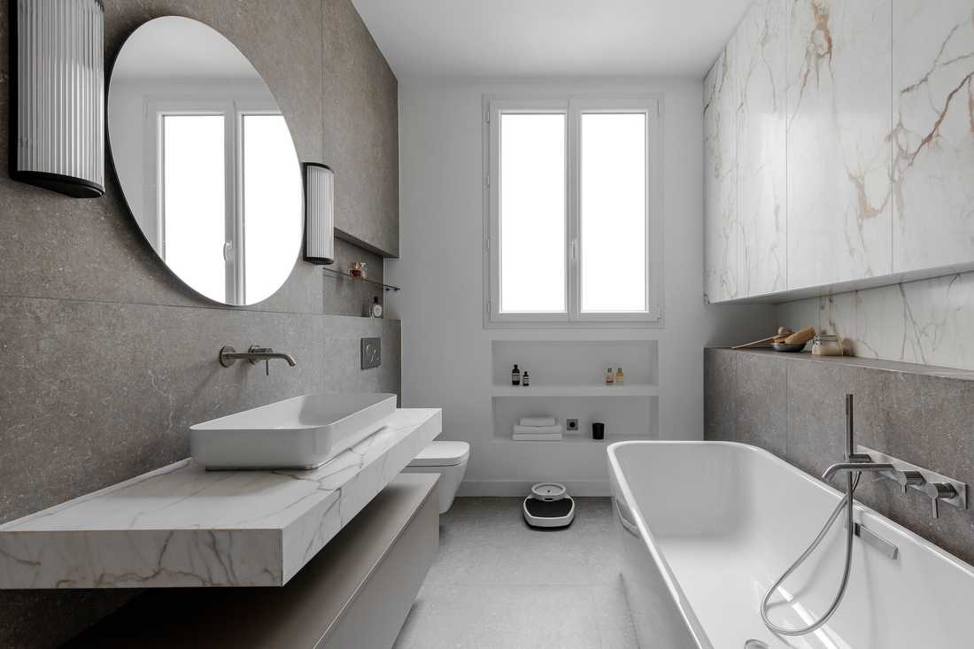 découvrez une salle de bain haussmannienne, un chef-d’œuvre élégant alliant charme classique et sophistication intemporelle pour un espace unique et raffiné.